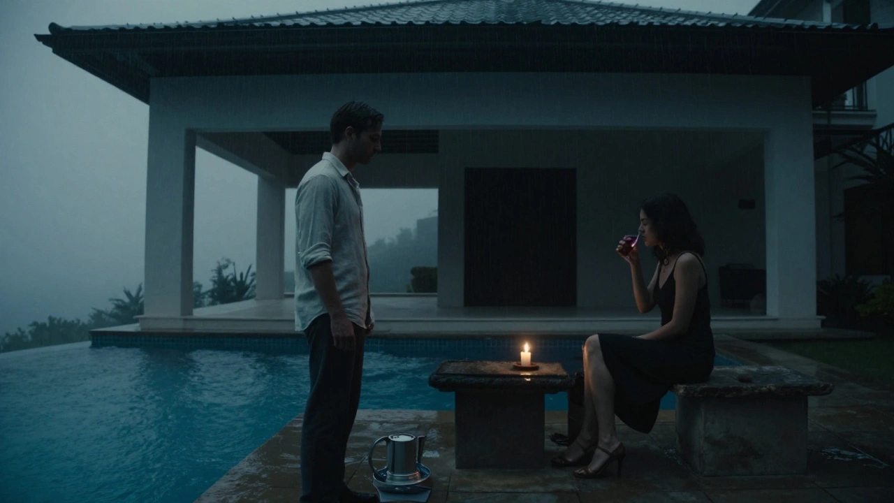 A man and woman sit in silence by a heated pool at midnight, rain falling over the dark Arabian Gulf, illuminated only by a single candle.